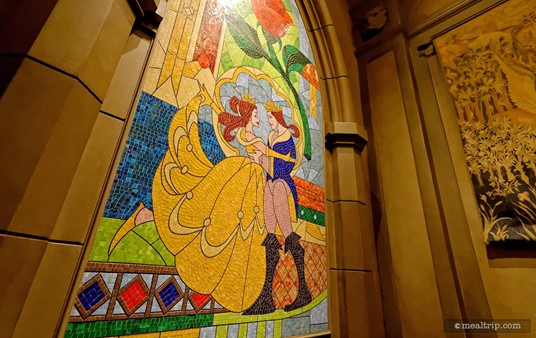 The "happily ever after" mural in the exit area of Be Our Guest.