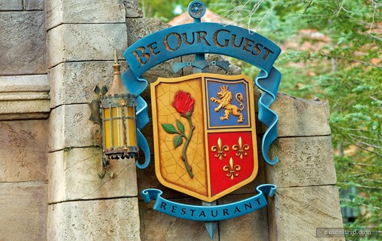 Be Our Guest sign at the foot of the bridge way to the restaurant.