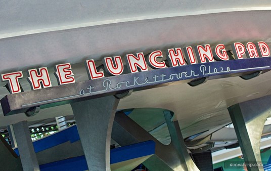 This Lunching Pad sign is under the TTA PeopleMover and AstroOrbiter attractions.
