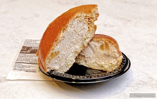 Cut in half, you can see the apple caramel ice cream inside the warm brioche in this Croque Glacé.