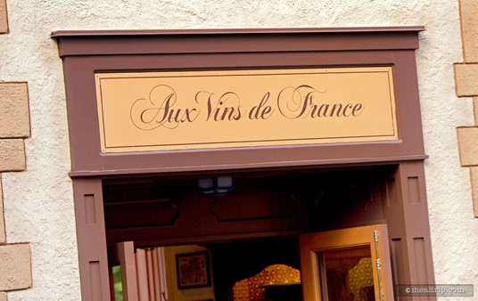 Sign over the entrance to Aux Vins de France.