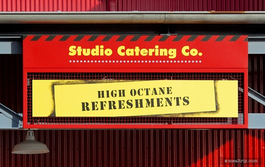 Although similar in design to the other Studio Catering Co signs, 
there's only one "High Octane Refreshments" sign over the "adult 
beverage" counter.