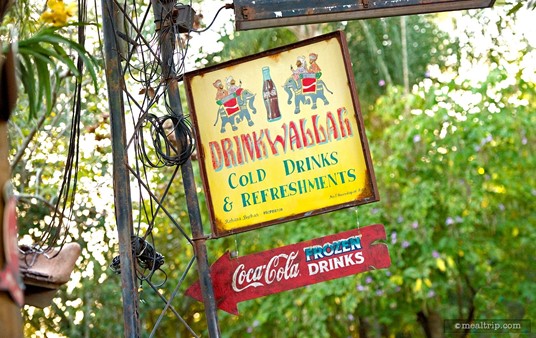 Street-side sign for Drinkwallah, one of the more immersing, detailed... soda stands.