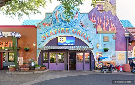 Here's a wide photo of the entrance to SeaWorld's Seafire Grill. The popular Flamecraft Bar location is directly to the left, and there's a small bathroom location to the right of the restaurant.