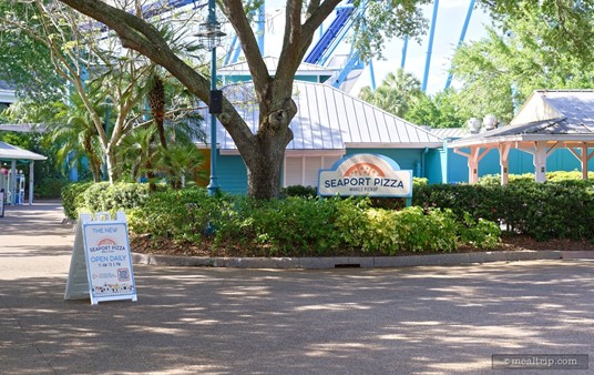 There are two a-frame signs in the walkway (both on the north and south sides of the restaurant), that state the location's operating hours. Also on the sign is a large QR Code, which presumably takes to you a page on your smart phone, explaining how the Mobile Pickup and Ordering works.