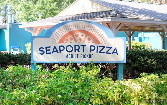The 2022 version of the Seaport Pizza sign features more of a pastel, or muted color system than the previous version. Also, the words "Mobile Pickup" are now a prominent part of the main sign.