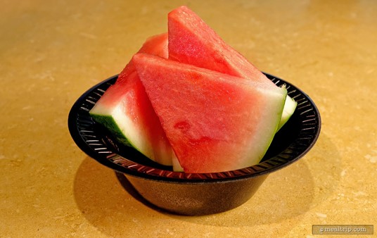 The Watermelon Slices are a side dish at the Spice Mill and most other SeaWorld Orlando dining locations. The fruit "side" is seasonal however, so sometimes it's an orange, or an apple, etc.