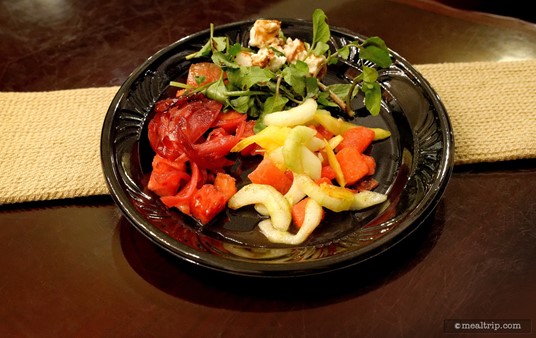 A combination of the salads plated.