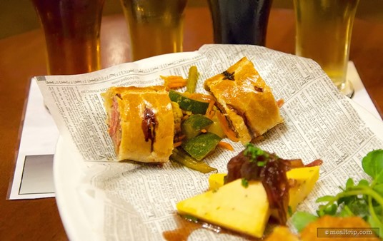 Pork and Apple Sausage Roll with House-made Piccalilli on the After Hours sampler plate.