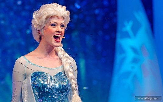 Before the dessert party, the Frozen Summer Fun Premium Package also 
includes reserved seats at the "For the First Time in Forever: A Frozen 
Sing-Along Celebration". Here, Elsa sings "Let It Go".