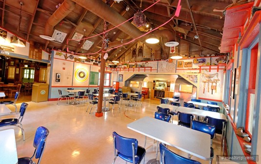 Here's a view of Restaurantosaurus' "the hip joint" seating area, with the trailer seating cut-away in the back.