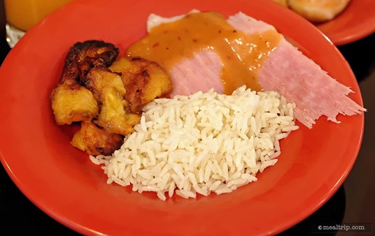 Spit Roasted Bone-in Ham (that is carved to order), with Spicy Honey Mustard Sauce, Basmati Rice with Lemon, Cinnamon, and Cardamon, and a few Sweet Plantains.