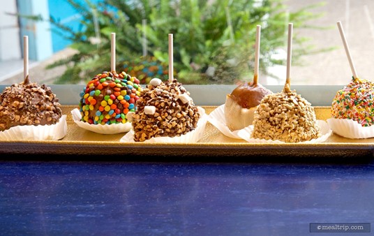 A line of the various chocolate covered apples is placed in the window at Sweet Sailin' Candy to showcase what you can expect to find in the shop.