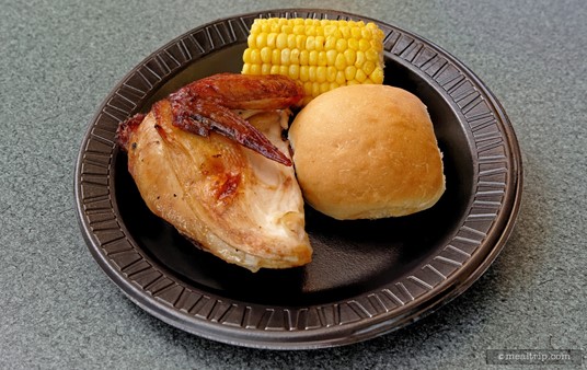 The BBQ Chicken from Terrace BBQ with one side item (corn on the cob in this case) and a dinner roll.