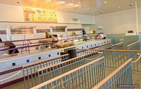 The food order and pickup line is located to the left of the main entrance.