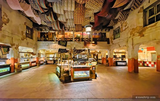 This is the main buffet area at Tusker House. There's not really any "line" per say, it's all an open concept. Guests can just walk up to whichever food paddock interests them, and grab some food. Plates, are located under the counters.