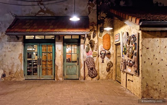 Across from the second check-in desk, there's a wall of masks. Back in the day, this area was a backdrop for a "Safari Donald" photo opportunity. Now, all of the characters are inside the restaurant.