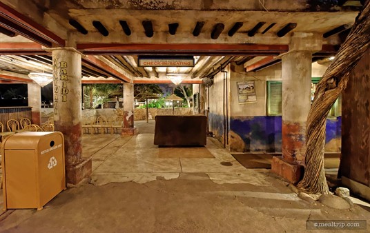 The check-in desk for Tusker House is in the center of this photo. There's a fairly large covered area here because (as with most character meals) there can be a bit of a wait between when you check-in, and when you get seated.