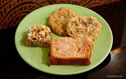 On the front of this plate is a Strawberry and White Chocolate Bread from Tusker House.