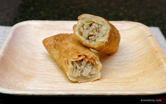 The Joy of Tea's Pork and Vegetable Egg Roll cut in half. One Vegetable Egg Roll is part of the lucky combo (along with other stuff), or you can get two of these as a single plated snack.