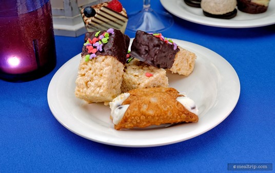 Chocolate Dipped Rice Crispy Treats are another favorite of mine... there's just something so familiar about them... but they're not as good as the ones mom makes! Also plated here are a couple of Cannolis.