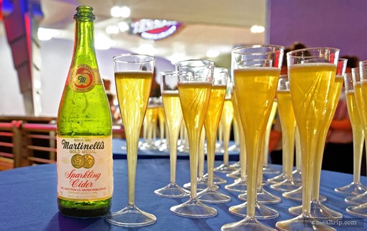 For those that must know... it's Martinelli's Sparkling Cider (non-alcoholic, sorry... this is still a "dry" party).