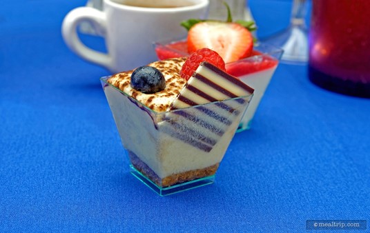 The Tiramisu includes a blueberry, a raspberry, and a thin square of chocolate.
