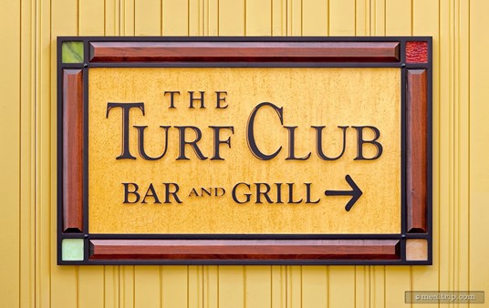 The Turf Club Bar and Grill sign, found in an interior hallway at Disney's Saratoga Springs Resort.