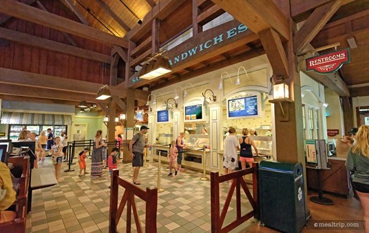 There are several different windows at the Riverside Mill Food Court. You order and pick up the food at the same window — and then move over to the payment registers that are in the center of the area.