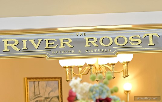 A River Roost sign as seen from the Port Orleans lobby.