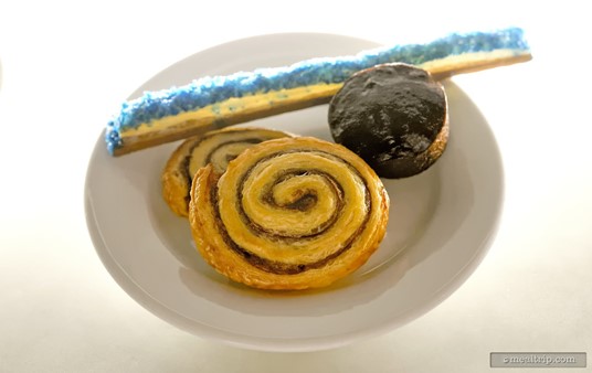 A Blue Lightsaber Puff Pastry Stick, Cinnamon Rolls, and a Double Chocolate Muffin from the Star Wars Breakfast Pastry plate. All of the pastries were quite good.