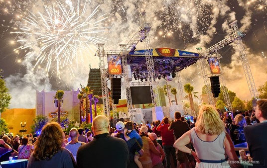 A view of the stage and fireworks at the Dessert Party portion of the Feel the Force Premium Package. The view of the fireworks is better now, that the "sorcerer's hat" has been removed, but the fireworks are still partially obscured by the stage.