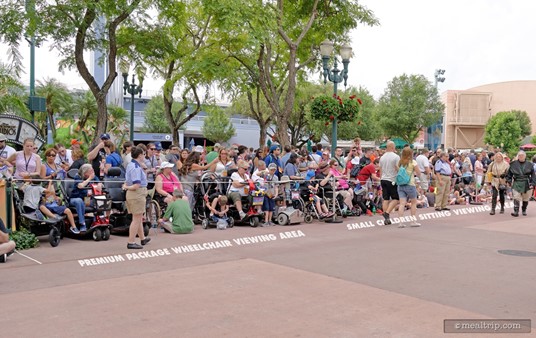From the main motorcade route leading to the stage, the first half is reserved for premium wheelchair access and viewing, while the second half is reserved for small children to sit down and watch the action. Parents can stand behind their children in this area, but can not sit with them.