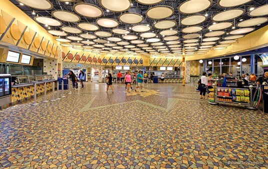 In this photo, the registers at Everything Pop are shown on the right hand side, while the food ordering and pick-up area is on the left. We think the design theming in this giant open area is very cool.