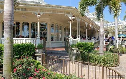 These stairs lead up to the shaded "waiting" porch on the east side of the restaurant. There's no porch on the west side because there's "Adventureland" water and jungle over there!