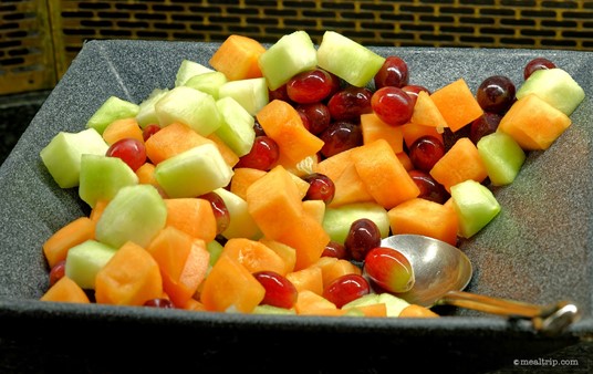 Here's a selection of mixed, cut fruit. There's a couple of mellons and some grapes in there.
