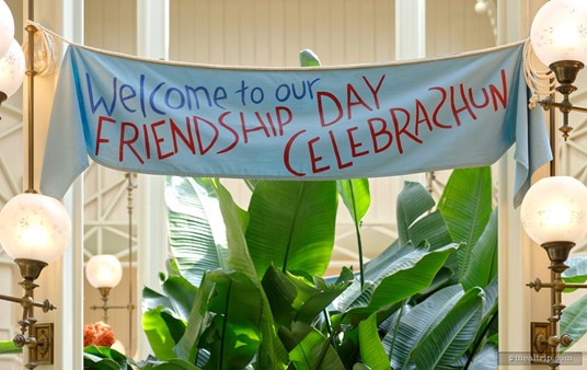 Ahhh... anyone that's been to the Crystal Palace will recognize this banner. It's the Friendship Day Celebration banner. A couple times each hour, Pooh and his friends will parade around the Crystal Palace to Friendship Day Celebration music... and then they'll go back to meeting with guests at each table.