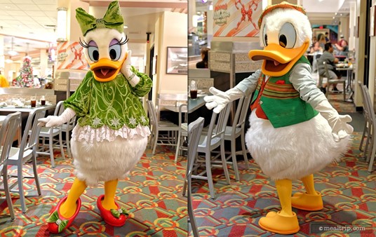 Daisy and Donald also make their way around from table to table. Donald seems to like his green holiday vest almost as much as Daisy likes her shoes!