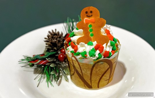 Awe... there's actually a tiny Gingerbread Man on top of my Gingerbread Cupcake!
