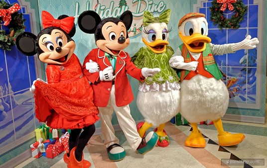 The "fab four" welcome guests to Minnie's Holiday Dine at Hollywood and Vine.