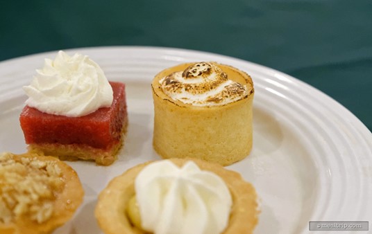 The small dessert in the back, with the brûléed top, is a Key Lime Pie Tart.