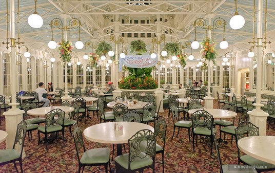 Both dining areas have smaller atriums at the back end of the room. In addition to being the home for some plants, they also act as bench style seating for tables that are positioned around them.