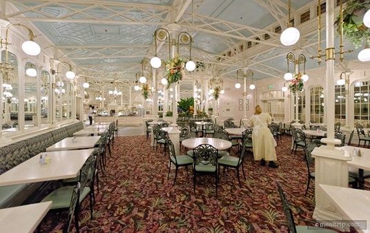 There are not any "full" booth style seats at the Crystal Palace. These half-booth, half-chair combos (pictured on the left) are as close as you can get to a booth.