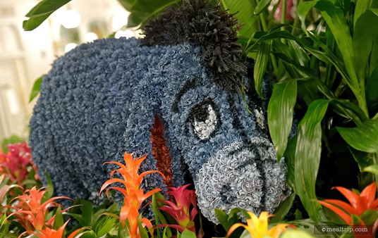 Hey there Eeyore. The Crystal Palace features four characters from Winnie the Pooh — in topiary form — Winnie the Pooh, Piglet, Tigger, and Eeyore. They're all located in the center of the restaurant, in a large atrium planter.