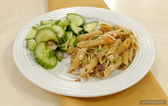 On this plate, from the prepared salads area on the Crystal Palace buffet line, is the Cucumber and Red Onion Salad (left) and some Mediterranean Pasta Salad (right).