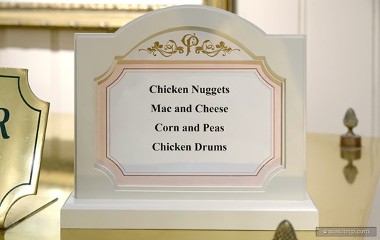The menu board for the children's table is lower, so the little ones can read it. (Side note, this food is actually pretty great too... so if you want some Mac and Cheese... here it is!)