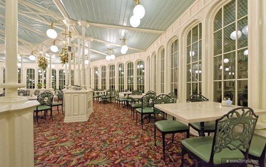 The west dining area at the Crystal Palace takes on a hexagonal shape thanks to the walls and seating arrangements.