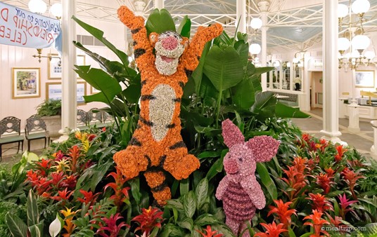 The topiaries in the center garden area at the Crystal Palace are made up of small flowers (artificial, but still). Pictured here are Tigger and Piglet.