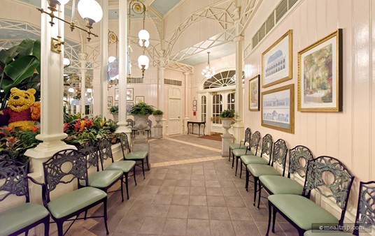 In the very center of the Crystal Palace, you'll find the largest atrium (on the left side of this photo). Pretty much as soon as you walk through the entrance, a path leads left and right around the large planter and topiary feature. Pictured here is a walkway that leads to the east dining area.