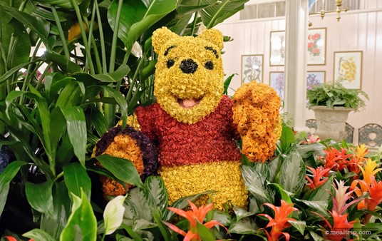 It's the Winnie the Pooh topiary, located in the center atrium area at the Crystal Palace.